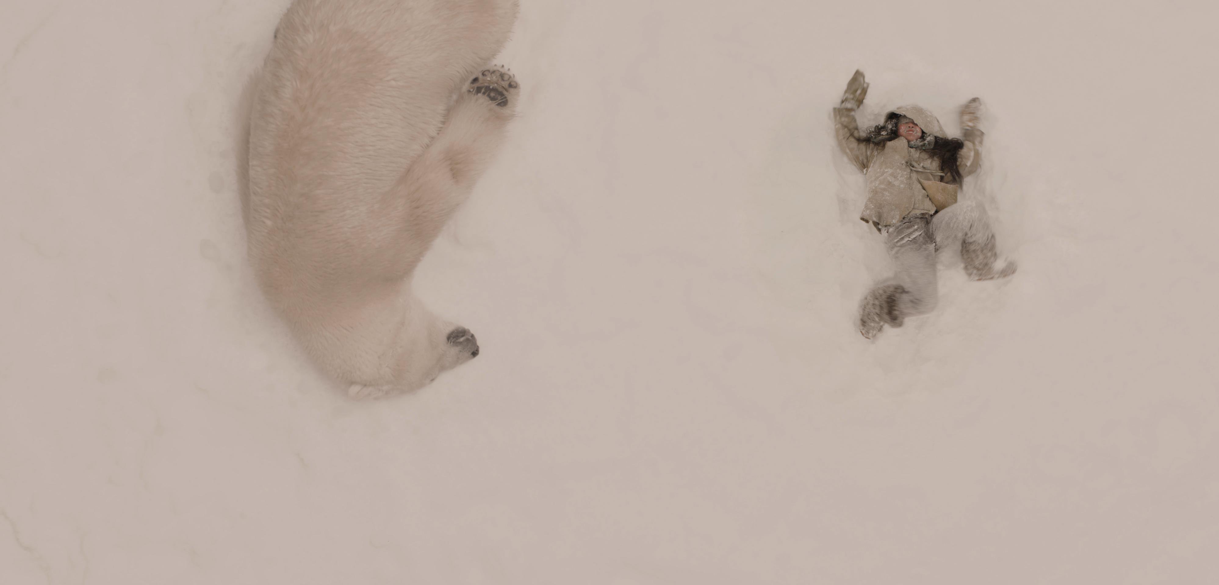 POLARIS - Mama Polar Bear (Agee) and Sumi (Viva Lee) play in the snow © Little Dipper Films